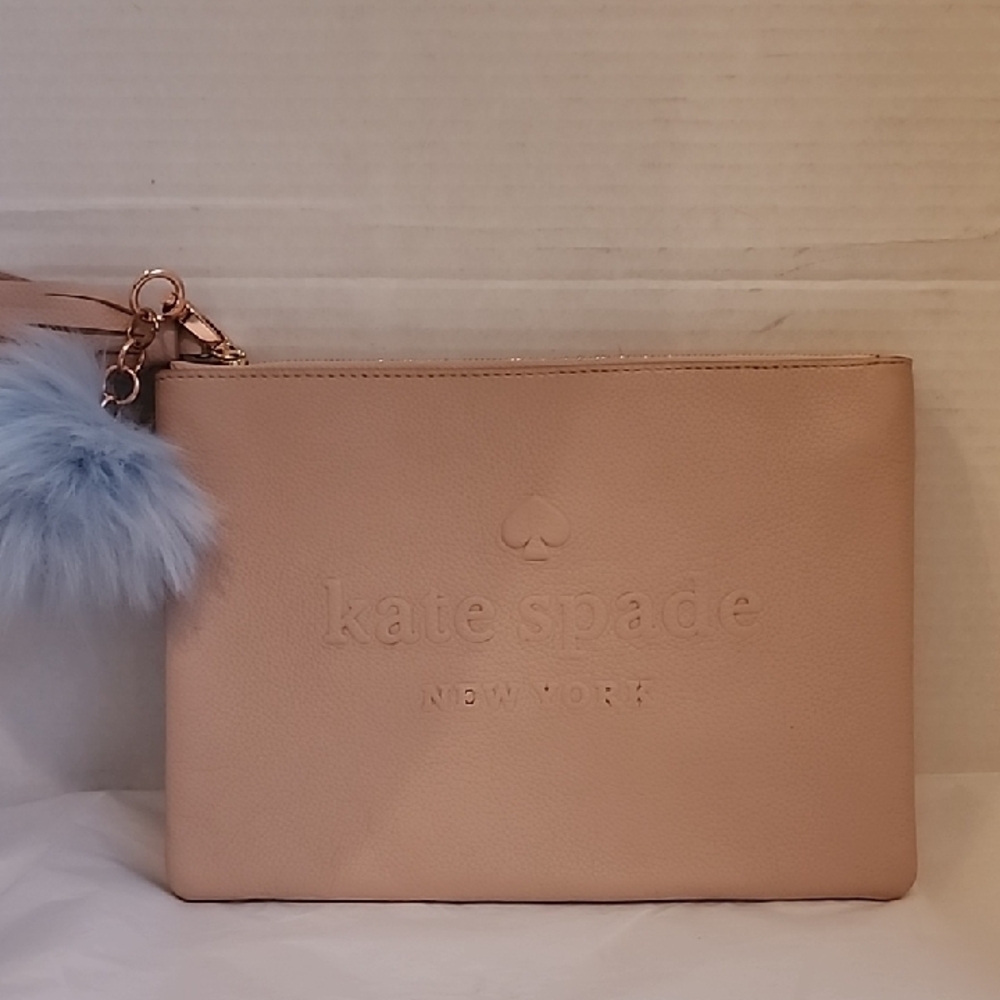 kate spade Pink Leather Wristlet with Pom Pom Charm